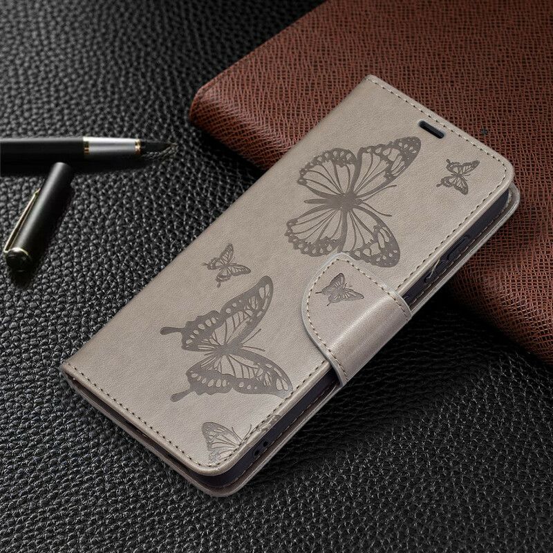 Kožené Puzdro Samsung Galaxy S21 FE Motýle V Lete So Šnúrkou
